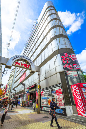 Tokyo, Japan - April 18, 2017: entrance to popular and tourist street market Ameya-Yokochomercato. Ameyoko is a busy market street along Yamanote Line tracks between Okachimachi and Ueno Stations.のeditorial素材
