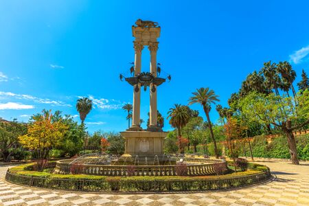 Beautiful garden in springtime landscape in Seville, Andalusia, Spain. Christopher Columbus Monument in Jardines de Murillo near Real Alcazar de Sevilla.の写真素材