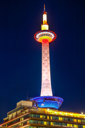 Kyoto, Japan - April 27, 2017: Kyoto Tower with Observation Deck illuminated by night. The tower lighthouse illuminating the city of Kyoto.のeditorial素材