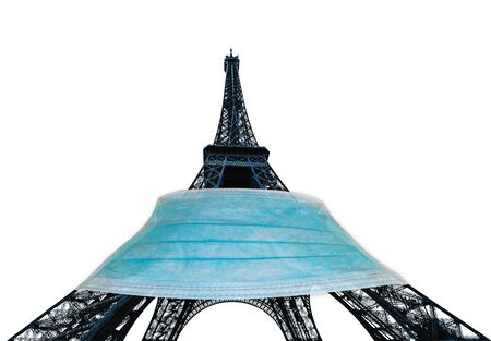 Eiffel tower or Tour Eiffel with surgical mask, symbol of Paris with Covid-19 isolated on white background. France and SARS-CoV-2 pandemic. French at time of Coronavirus and quarantine.の写真素材