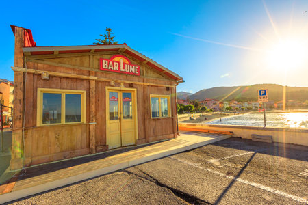 Marciana Marina, Elba island, Italy - June 17, 2020: Location set at sunset of The crimes of BarLume fiction serie TV taken from a novel bestseller at Marciana Marina. Popular travel landmark.のeditorial素材