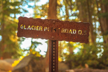 Road sign of Glacier Point road in Yosemite National Park, California, United States. Glacier Point is the view of Half Dome, Clouds Rest, Liberty Cap, Vernal Fall and Nevada Fall in Yosemite Valley.の写真素材