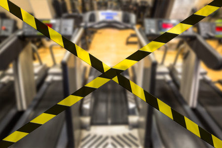 Concept of gyms closure for Coronavirus pandemic. Covid-19 quarantine lockdown of sports activities...