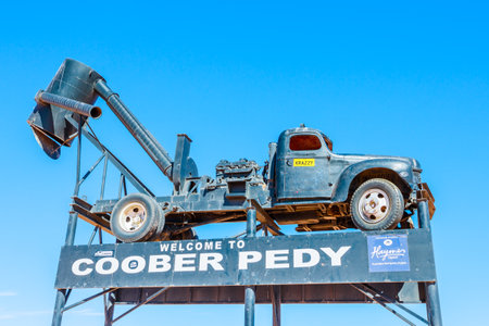 Coober Pedy, South Australia, Australia - Aug 28, 2019: Coober Pedy information board with blower truck. Opal mining capital of the Australia.のeditorial素材