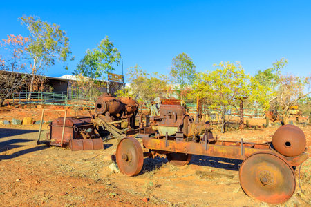 Tennant Creek, Australia - Aug 2019: rusty machines for gold digging of Battery Hill Mining Center, Tennant Creek in Northern Territory of Australia. Old underground mine and museum.のeditorial素材