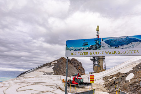 Titlis, Engelberg, Switzerland - Aug 27,2020: station of Ice-Flyer chair lift of Titlis mountain peak of Uri alps at 3040 m. Located in cantons of Obwalden and Bern, Switzerland, Europe, Summer seasonのeditorial素材