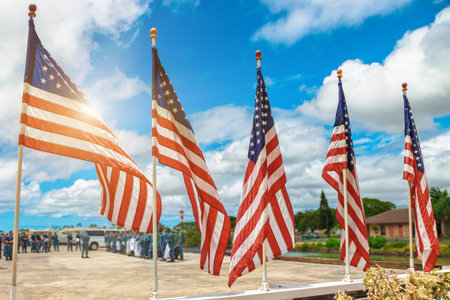 American flags with American army soldiers on background. U.S. National patriotic concept for...