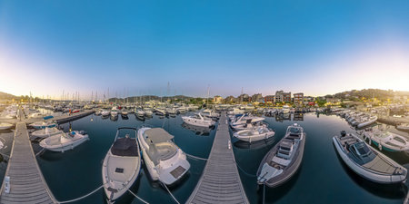 Aerial panorama of Porto Vecchio city harbor at night in Corsica island of France. Drone view of...