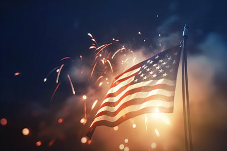 On the night of Independence Day, the American flag proudly flutters in the sky over the city. The stunning fireworks display adds to the patriotic feeling of celebration.の素材