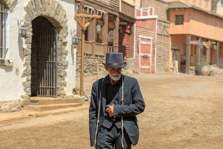 Gran Canaria - April 2023: Sioux City park showcases horse riding demos and photo opportunities with cowboys and Undertakers in traditional attire.のeditorial素材