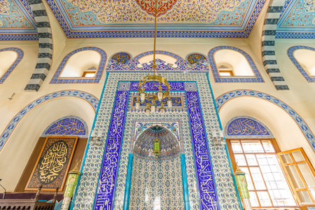 Konya, Turkey - Aug 5,2023: mihrab of Kapu Camii Mosque is a masterpiece of Islamic artistry. Adorned with intricate patterns and Arabic calligraphy, it serves as the focal point for worshippersのeditorial素材