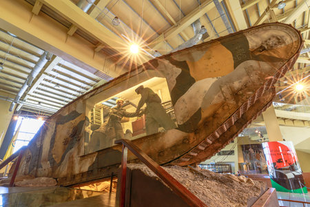 Royal Tank Museum, Amman, Jordan - May 4, 2024: Historically significant Mark I British tank interior with a mannequin dressed as a soldier on display at the Royal Tank Museum in Jordanのeditorial素材