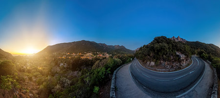 Aerial drone view of the Piana Badlands of Corsica on the D81 route at night. Les Calanques of Piana...