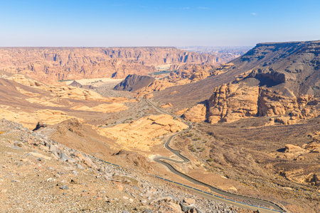 Capturing a breathtaking aerial view from Harrat Viewpoint, revealing the stunning expanse of AlUla Old Town amidst Saudi Arabias rugged desert landscapesの写真素材