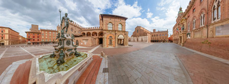 360-degrees panorama of the Neptune Fountain in Piazza Maggiore square with Palazzo Accursio city hall in the background, and San Petronio Basilica. In Bologna, Italy, during spring day without peopleの写真素材