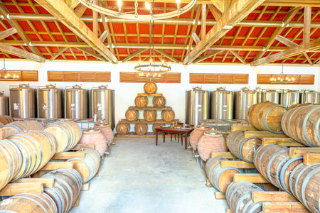 Martinique, French Antilles - Dec 26, 2025: Rhum A-1710 distillery aging room showing long rows of...