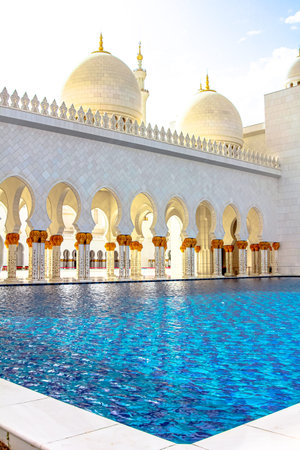 Sheikh Zayed Grand Mosque of Abu Dhabi, a notable landmark, features its grand arches and domes...