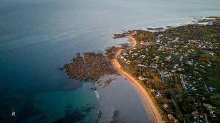 Beautiful and warm beach at sunset on an island, France, West coastの写真素材