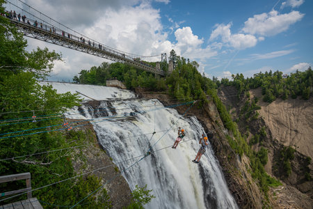 Montmorency waterfall from the bush. Only 10kms away from Quebec City. That waterfall is amazing because superpowerful. You can feel the power of it when you hear the water smashing downsideのeditorial素材