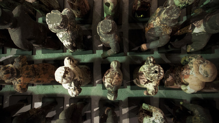 Wooden small vintage statues of people.の写真素材