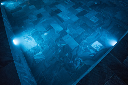 Swimming pool surface in a Vietnamese resort at nightの写真素材