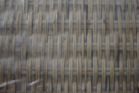 Rice paper sun drying on bamboo mats for spring rolls in Vietnamの写真素材