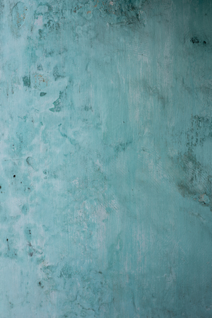 Old painted wall of a French colonial house in Hoi An, Vietnamの写真素材