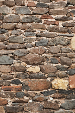Old house's stones wall in Celles, south of Franceの写真素材