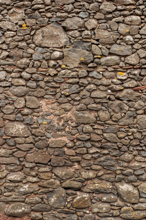 Old house's stones wall in Celles, south of Franceの写真素材