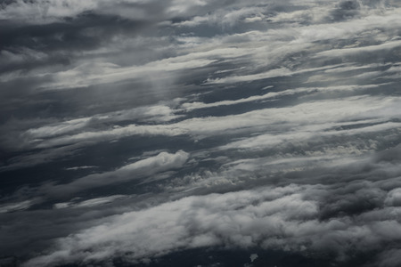 Clouds over Asia from a planeの写真素材