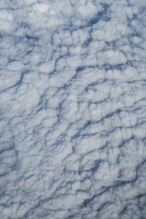 Clouds over Asia from a planeの写真素材