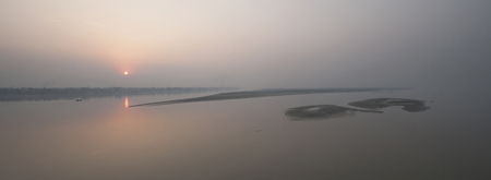 Sunset on the river Ganges in Patna, Indiaの写真素材