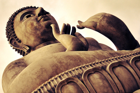 A huge statue of the Buddha is seen during the construction of a temple in Central Thailand in May 2012のeditorial素材