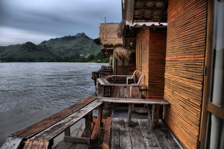 Wooden bungalows on the Kwai river in Kanchanaburi, Thailandのeditorial素材