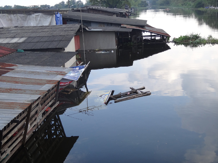 Houses are flooded by a canal in Rangsit, Thailand, in October 2011のeditorial素材