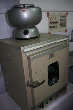 Remi Lab World laboratory scientific instrument is seen on a table in an Indian clinic in Biharのeditorial素材