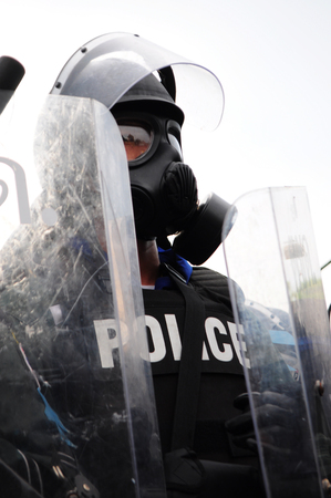 Bangkok/Thailand - 11 24 2012: Riot police face protesters at Royal Plaza.のeditorial素材