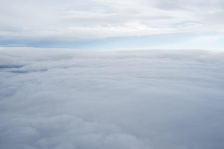 Clouds over Asia from a plane.の写真素材
