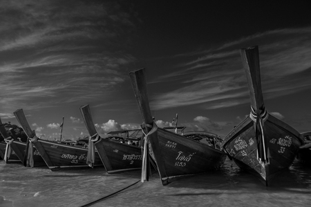 Traditional fishing boats on the beach on Koh Lipe in Southern Thailand.のeditorial素材