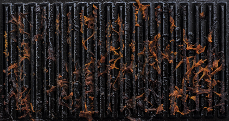 Fried pumpkin stuck on the cooking plane.の写真素材