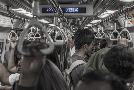 Passengers commute in the Singapore subway.のeditorial素材