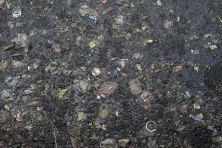 Surface of a polluted river in Jakarta, Indonesia.の写真素材
