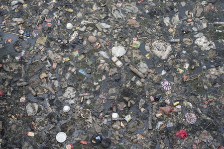 Surface of a polluted river in Jakarta, Indonesia.の写真素材