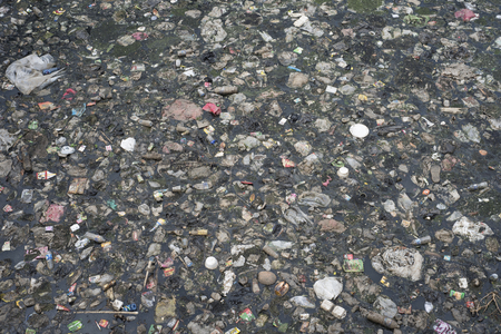 Surface of a polluted river in Jakarta, Indonesia.の写真素材