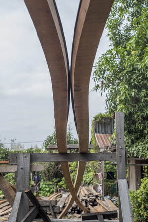 Large wooden boat making in Nga Bay, southern Vietnamの写真素材