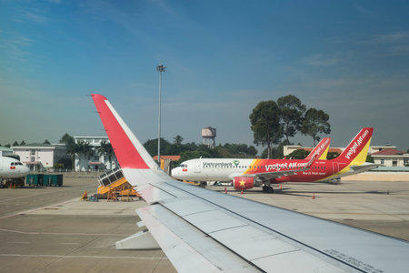 Airplane waiting at Ho Chi Minh City airport, Vietnam.