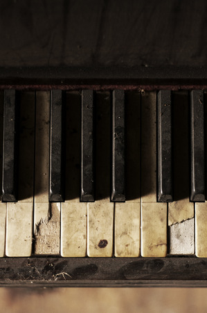 Detail of an old broken pianoの写真素材