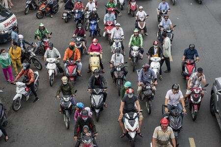 Vietnamese bike riders commute in a jammed street of Ho Chi Minh Cityのeditorial素材