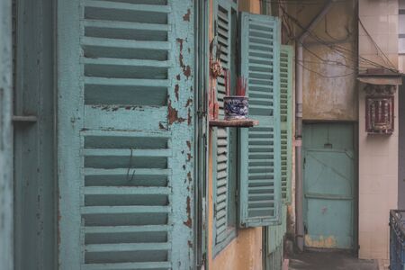 Detail of a houseâs facade at Hao Si Phuong old traditional alley in Ho Chi Minh City, Vietnamの写真素材