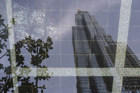 Reflection on water of Landmark 81 skyscraper viewed from the street in Ho Chi Minh City, Vietnamのeditorial素材